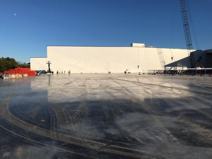 Reinforcing, dowel baskets, and jointing in place on a large industrial slab pour